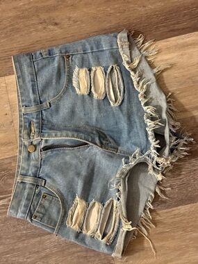 SHEIN Light Blue Distressed Denim Cutoff Shorts